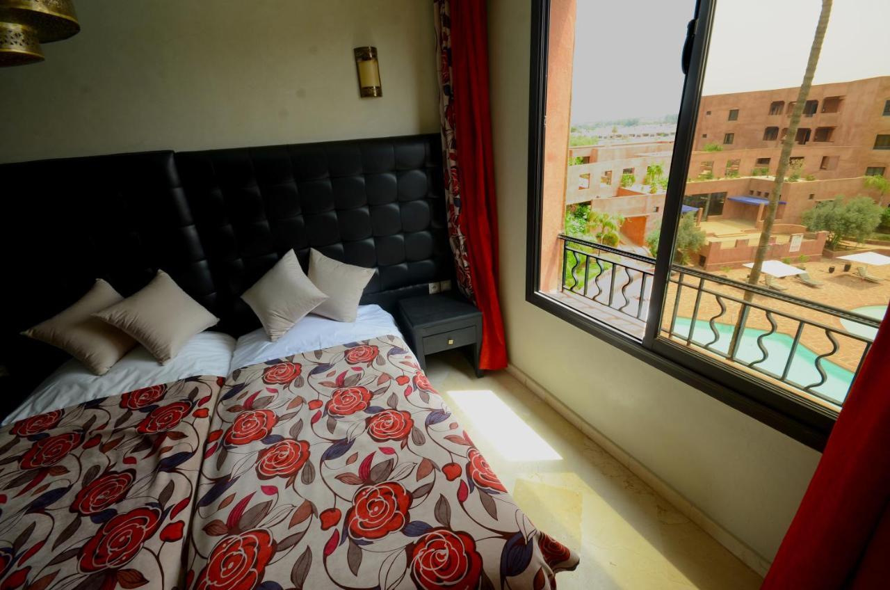 マラケシュAppart Vue Piscine Et Montagne Marrakechアパートメント エクステリア 写真
